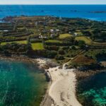 St Anges - Isle of Scilly surrounded by blue green waters. Channel islands cruise
