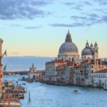 Venice canals with old buildings lining the banks. Cruise The Mediterranean