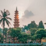 View of Hanoi building spire as part of the itinerary of The Red River river cruise.